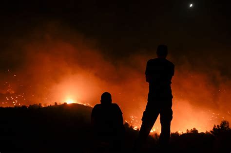 Greece wildfires blaze with no respite as islands evacuated